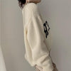 Buiten Blik Breid Sweater Met Contrast Letters